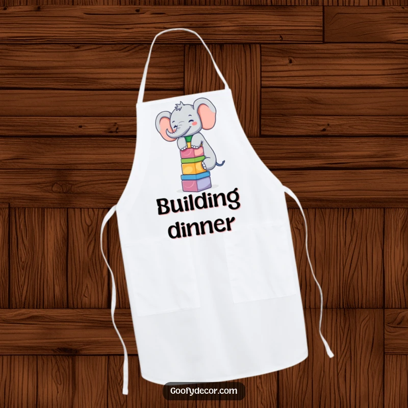 Funny giggling elephant balancing colorful blocks while wearing an apron, a humorous kitchen essential.