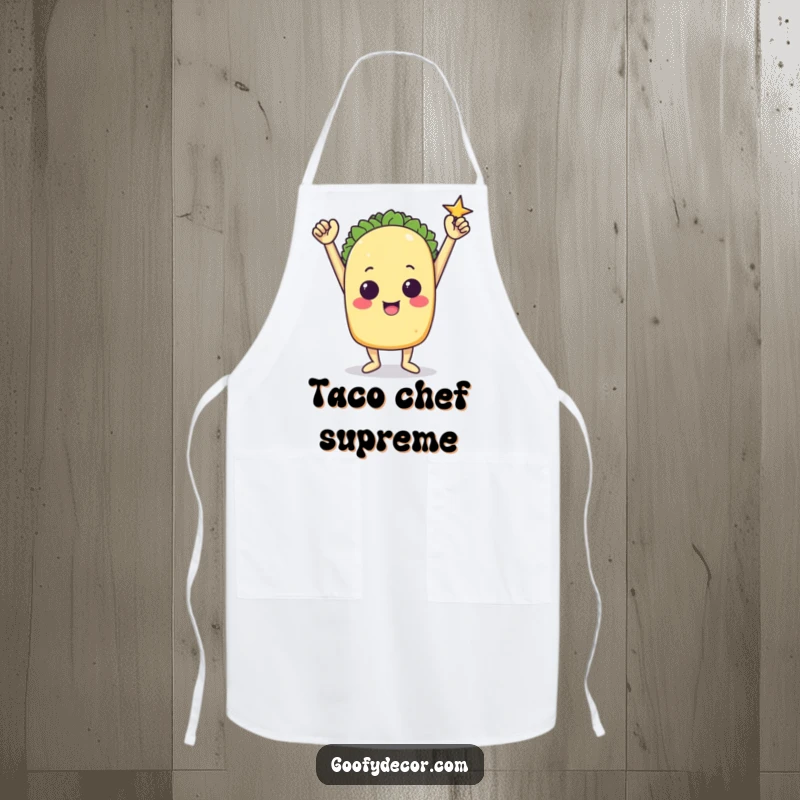 Funny apron with a triumphant taco character striking a victory pose while cooking.