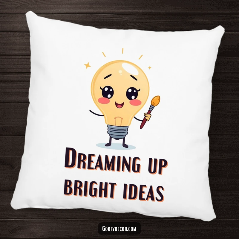 Funny pillow featuring a lightbulb character with artistic tools, offering comfort and creative inspiration for relaxation spaces.