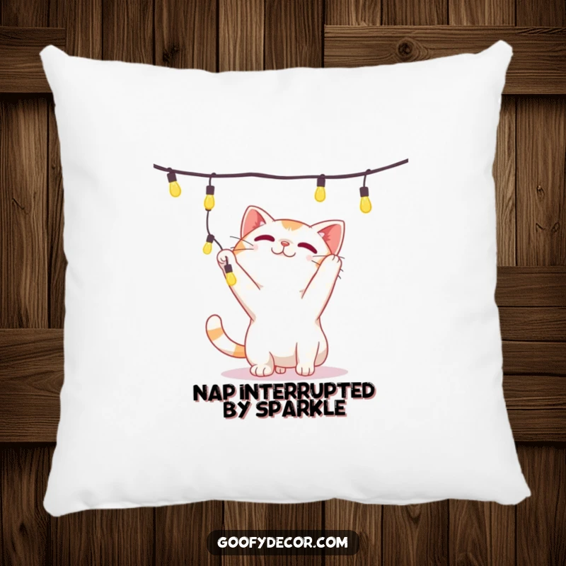 Funny pillow showcasing a playful cat character batting charmingly at a string of luminous, festive lights.