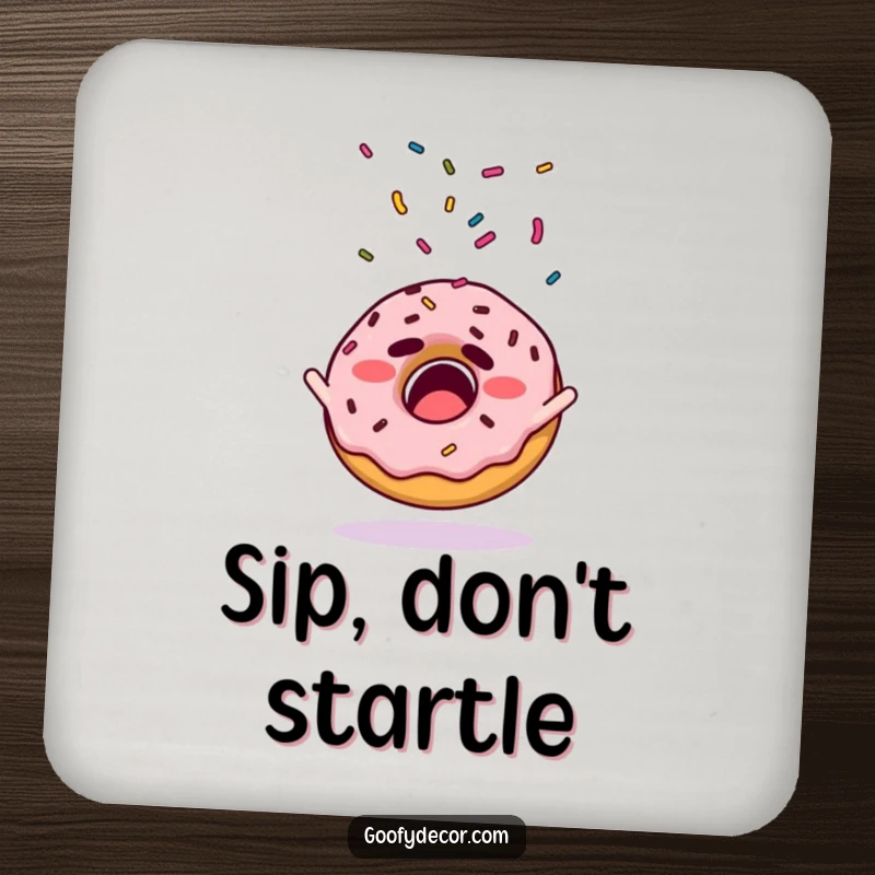 Funny drink coaster featuring a startled donut character with its sprinkles flying outwards.