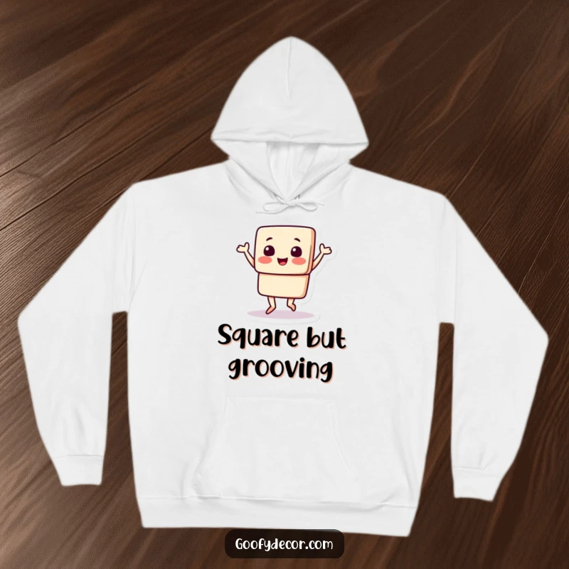 Funny hoodie showcasing a square character happily doing a jig, radiating comfort, coziness, and infectious cheerful energy.