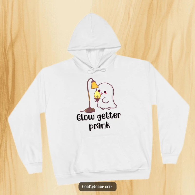Funny Kawaii Ghost Tickling Lamp Hoodie: Soft hoodie featuring a cute ghost playfully tickling a lamp, ideal for comfort and spooky humor. A warm funny gift.