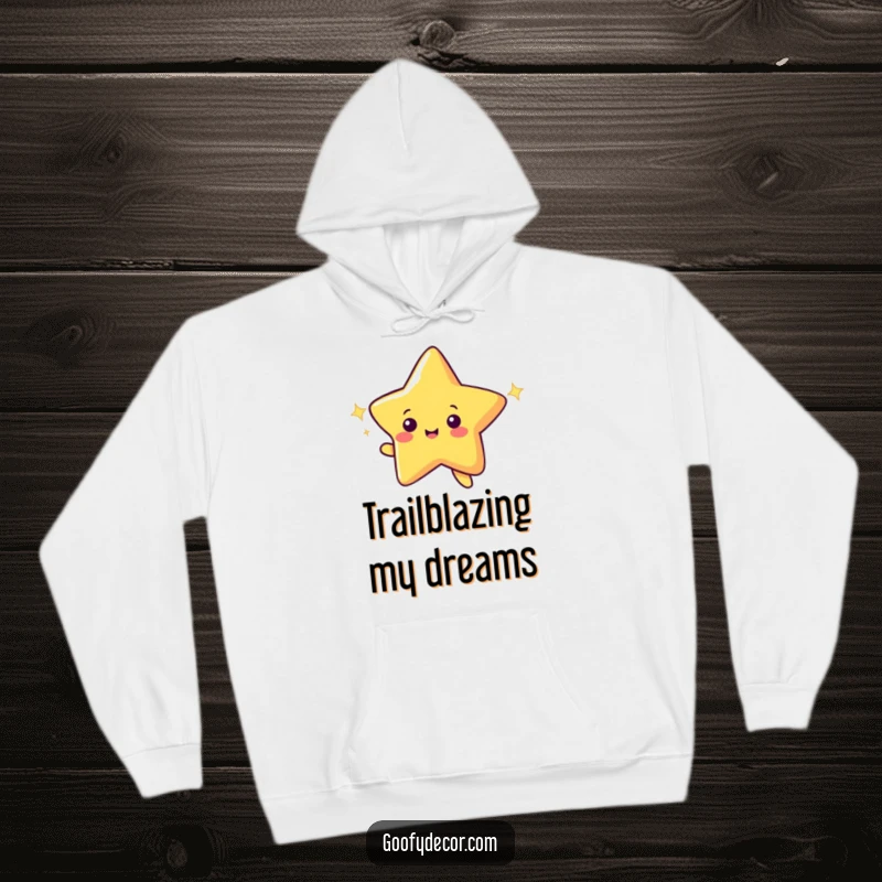 Funny hoodie featuring a cheerful shooting star character making a wish with a dazzling, sparkling trail.