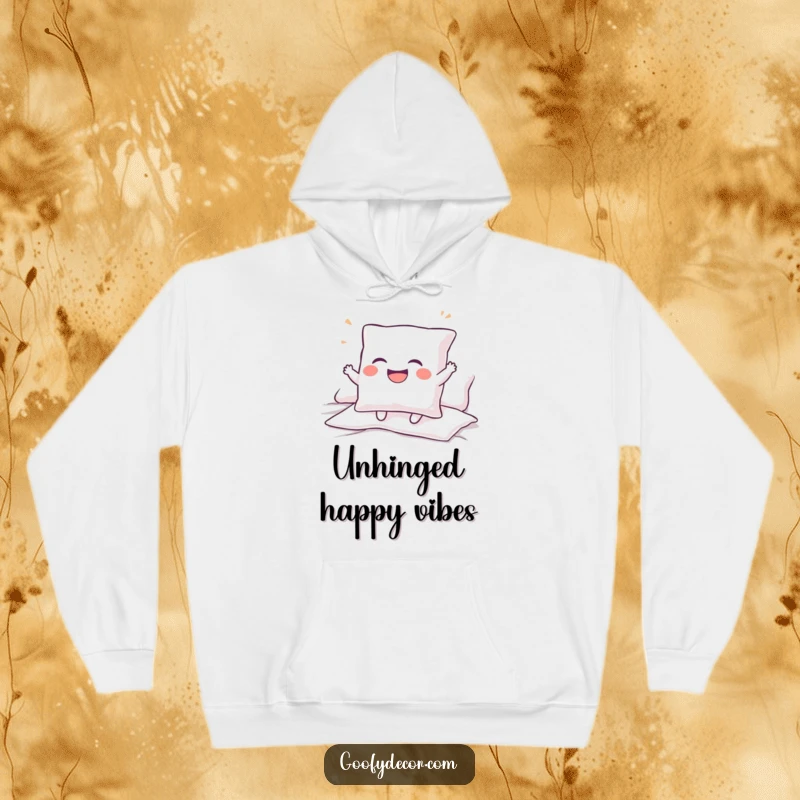 Funny hoodie featuring a giggling pillow character bouncing on a bed, providing cozy comfort and a cheerful vibe.