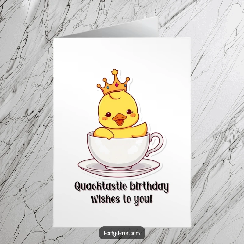 Funny free printable birthday card: Delighted rubber ducky wearing a crown, sailing regally in a teacup, celebrating birthday.