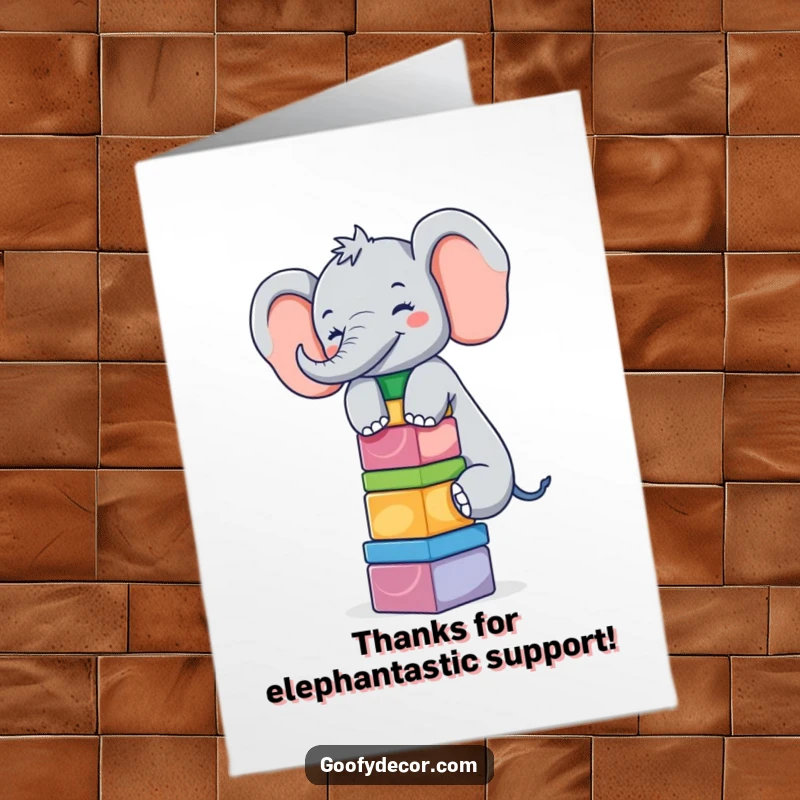Funny Free Printable Thank You Card: A giggling elephant balancing colorful blocks, conveying heartfelt thanks with a sweet smile.